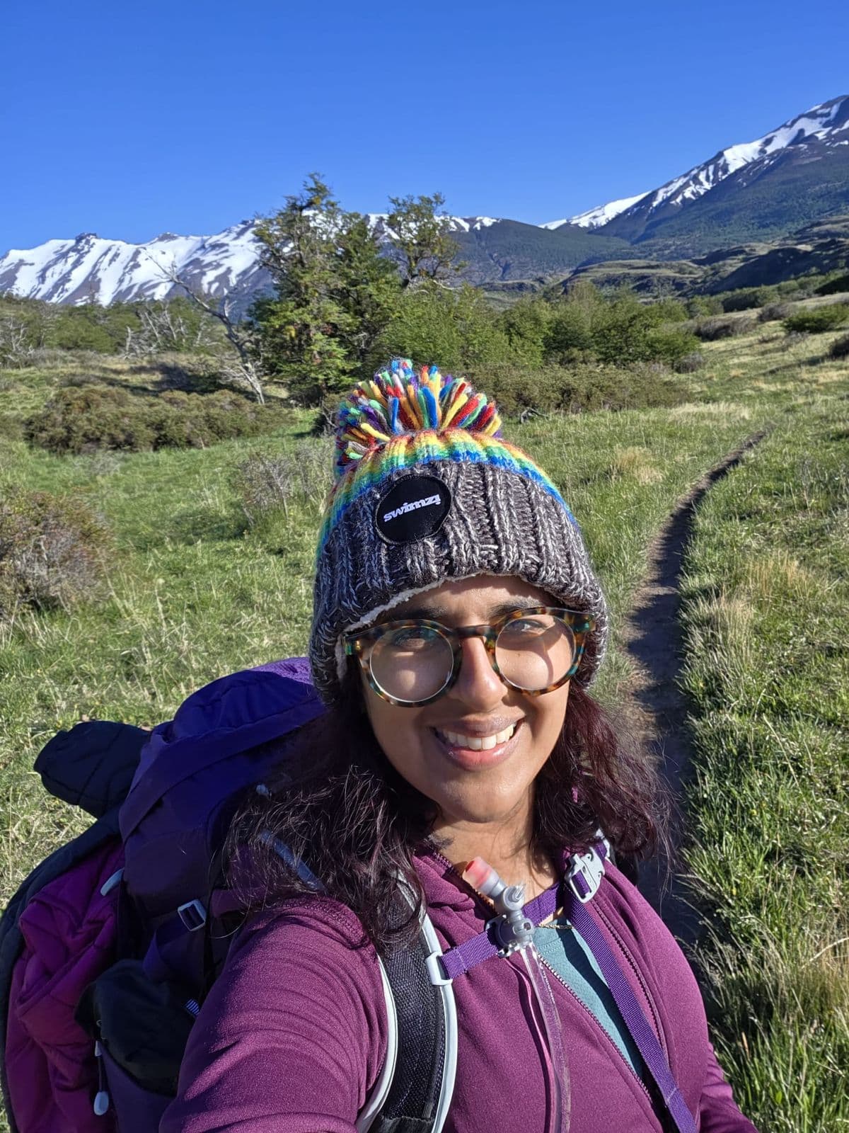 Shruti Turner smiling while hiking in Patagonia