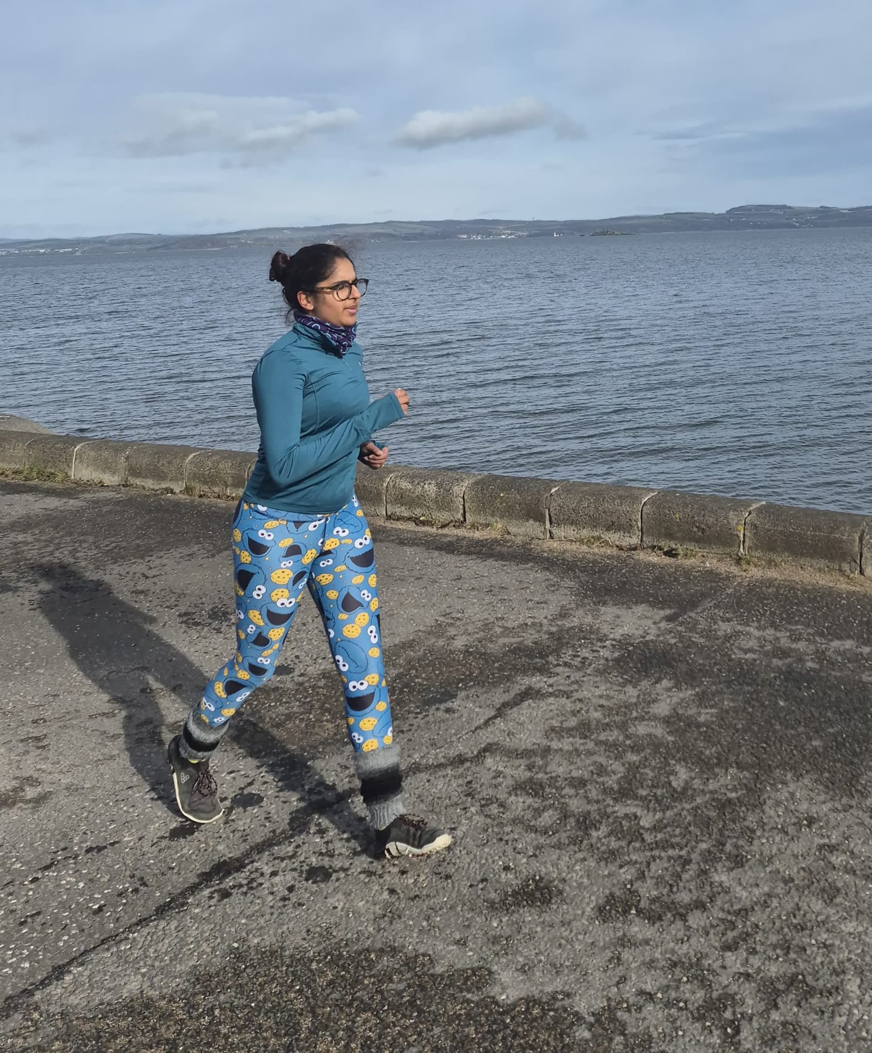 Shruti Turner running by the sea